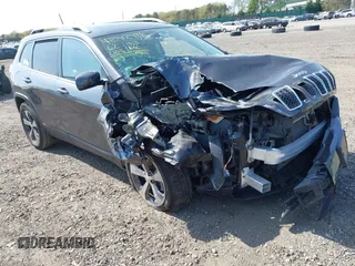 2019 Jeep Cherokee High Altitude with VIN 1C4PJMDX1KD356852, listed as a IAAI auction lot 42142416 with 62,003 mi miles and . Bid and sale history available at DreamBid. Image 1.