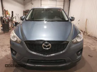 2015 Mazda CX-5 Grand Touring with VIN JM3KE4DY7F0504398, listed as a IAAI auction lot 41698365 with 122,121 mi miles. Bid and sale history available at carsss.com. Image 12.