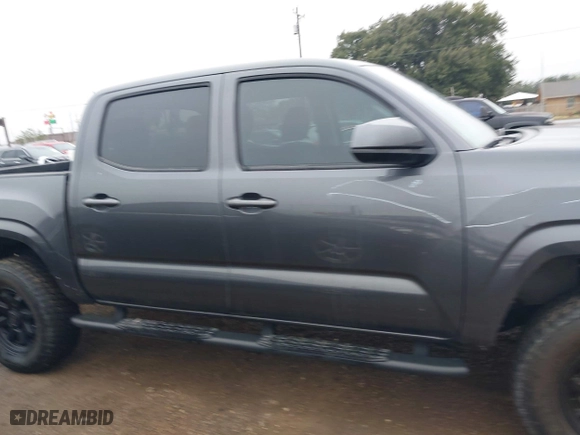 2023 Toyota Tacoma 4WD SR with VIN 3TYCZ5AN5PT157657, listed as a IAAI auction lot 41412536 with 12,828 mi miles. Bid and sale history available at carsss.com. Image 14.