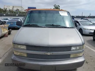 1995 Chevrolet Astro with VIN 1GNDM19W2SB240300, listed as a IAAI auction lot 41885699 with 180,150 mi miles. Bid and sale history available at carsss.com. Image 6.