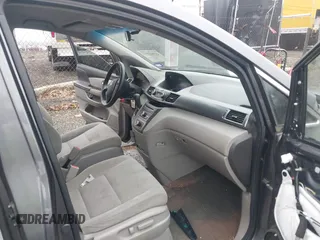 2014 Honda Odyssey LX z VIN 5FNRL5H2XEB009962, wystawiony jako IAAI lot #41902277 z przebiegiem 152 661 mil mil oraz . Historia ofert i sprzedaży dostępna na DreamBid. Obrazek 5.