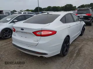 2014 Ford Fusion SE Hybrid with VIN 3FA6P0LU9ER243047, listed as a IAAI auction lot 42417116 with 258,266 mi miles and . Bid and sale history available at DreamBid. Image 4.