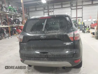 2017 Ford Escape Titanium with VIN 1FMCU9J9XHUB51401, listed as a IAAI auction lot 41025642 with 77,908 mi miles. Bid and sale history available at carsss.com. Image 16.