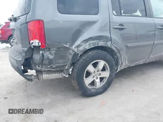 2011 Honda Pilot EX-L with VIN 5FNYF4H59BB042308, listed as a IAAI auction lot 41635511 with 196,736 mi miles and . Bid and sale history available at carsss.com. Image 6.