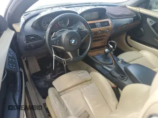 2006 BMW 6 Series 650Ci z VIN WBAEK13406CN72369, wystawiony jako Copart lot #47076175 z przebiegiem 97 684 mil mil oraz Czysty tytuł • Clean title. Historia ofert i sprzedaży dostępna na DreamBid. Obrazek 8.