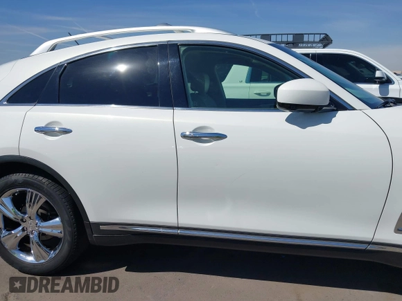 2011 Infiniti FX z VIN JN8AS1MW8BM734422, wystawiony jako IAAI lot #41896612 z przebiegiem 153 404 mil mil oraz . Historia ofert i sprzedaży dostępna na DreamBid. Obrazek 13.