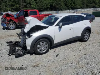 2016 Mazda CX-3 Sport z VIN JM1DKBB79G0106653, wystawiony jako Copart lot #58154045 z przebiegiem 69 755 mil mil oraz Szkoda całkowita • Salvage title. Historia ofert i sprzedaży dostępna na DreamBid. Obrazek 1.