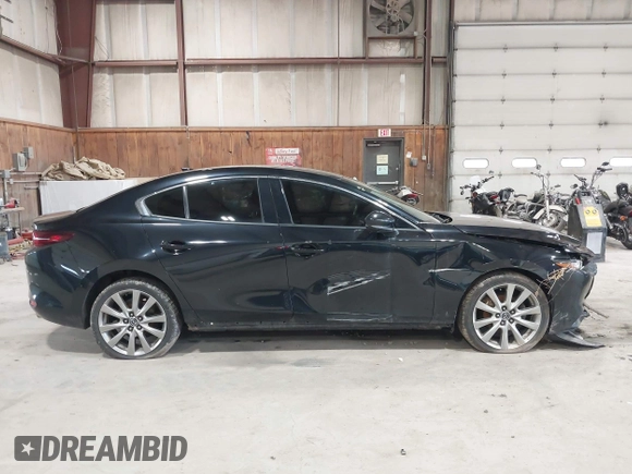 2020 Mazda 3 Premium with VIN 3MZBPBEM4LM123018, listed as a IAAI auction lot 41967652 with 84,642 mi miles and . Bid and sale history available at DreamBid. Image 13.