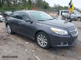 2013 Chevrolet Malibu LTZ with VIN 1G11H5SA5DF267940, listed as a IAAI auction lot 41854067 with 159,946 mi miles. Bid and sale history available at carsss.com. Image 1.