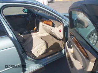 2004 Jaguar XJ 8 with VIN SAJEA71CX4SG10751, listed as a IAAI auction lot 42149348 with 89,786 mi miles and . Bid and sale history available at DreamBid. Image 5.