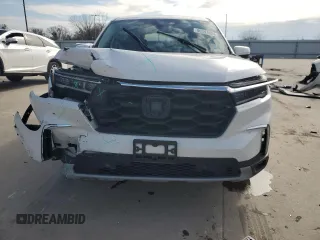 2023 Honda Pilot EX-L 8 Passenger with VIN 5FNYG2H46PB008987, listed as a Copart auction lot 86347604 with 12,321 mi miles and Salvage Title. Bid and sale history available at carsss.com. Image 5.
