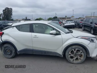 2019 Toyota C-HR XLE z VIN JTNKHMBX3K1029701, wystawiony jako IAAI lot #42023964 z przebiegiem 83 055 mil mil oraz . Historia ofert i sprzedaży dostępna na DreamBid. Obrazek 13.