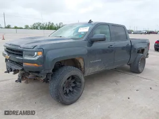 2017 Chevrolet Silverado 1500 LT with VIN 3GCUKREC1HG253015, listed as a IAAI auction lot 41951961 with 148,239 mi miles. Bid and sale history available at carsss.com. Image 2.