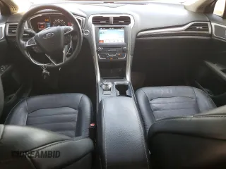 2017 Ford Fusion SE z VIN 3FA6P0H98HR328552, wystawiony jako Copart lot #52709395 z przebiegiem 188 451 mil mil oraz Szkoda całkowita • Salvage title. Historia ofert i sprzedaży dostępna na DreamBid. Obrazek 8.