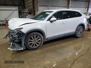 2016 Mazda CX-9 Grand Touring z VIN JM3TCADYXG0107228, wystawiony jako Copart lot #61239305 z przebiegiem 123 462 mil mil oraz Szkoda całkowita • Salvage title. Historia ofert i sprzedaży dostępna na DreamBid. Obrazek 1.