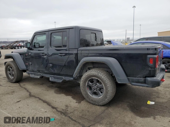 2023 Jeep Gladiator Rubicon with VIN 1C6JJTBG6PL500516, listed as a Copart auction lot 43432015 with 107,096 mi miles and Salvage title. Bid and sale history available at DreamBid. Image 2.
