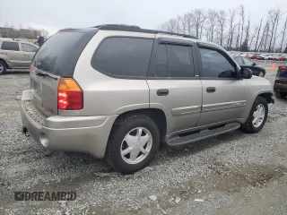 2002 GMC Envoy SLT with VIN 1GKDT13S522425155, listed as a Copart auction lot 48575895 with 52,307 mi miles and Salvage Title. Bid and sale history available at carsss.com. Image 3.