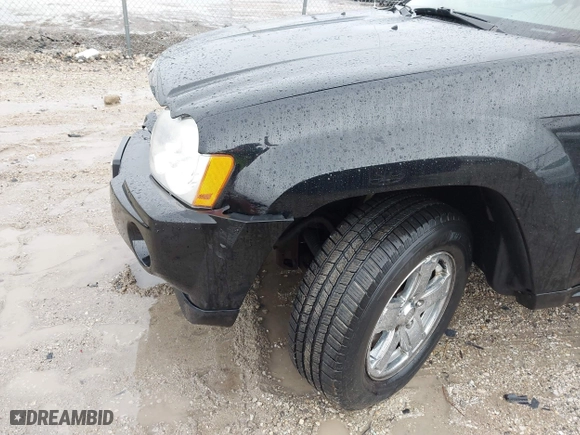 2006 Jeep Grand Cherokee Overland with VIN 1J8HR68296C308382, listed as a IAAI auction lot 41466673 with 167,028 mi miles. Bid and sale history available at carsss.com. Image 14.