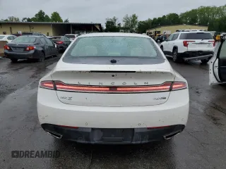2015 Lincoln MKZ z VIN 3LN6L2J9XFR605027, wystawiony jako Copart lot #57724605 z przebiegiem 76 845 mil mil oraz Czysty tytuł • Clean title. Historia ofert i sprzedaży dostępna na DreamBid. Obrazek 6.