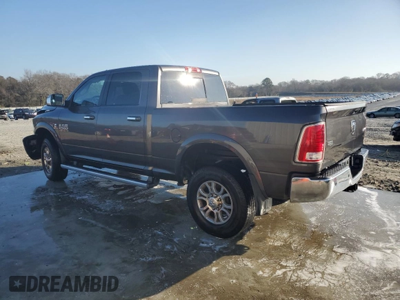 2014 Ram 2500 Laramie with VIN 3C6UR5FL4EG276004, listed as a Copart auction lot 42636305 with 228,911 mi miles and Salvage Title. Bid and sale history available at carsss.com. Image 2.
