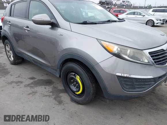 2013 Kia Sportage LX with VIN KNDPBCA23D7529658, listed as a IAAI auction lot 42473877 with 114,797 mi miles and . Bid and sale history available at DreamBid. Image 6.