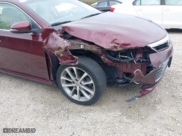 2014 Toyota Avalon Limited with VIN 4T1BK1EB5EU124568, listed as a IAAI auction lot 41996280 with 102,440 mi miles. Bid and sale history available at carsss.com. Image 6.