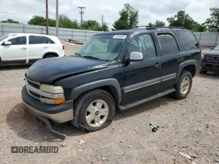 2002 Chevrolet Tahoe LT with VIN 1GNEC13Z52R303777, listed as a Copart auction lot 54942055 with 291,043 mi miles and Salvage title. Bid and sale history available at DreamBid. Image 1.
