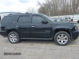 2011 GMC Yukon SLT with VIN 1GKS2CE01BR347675, listed as a IAAI auction lot 41931635 with 247,817 mi miles. Bid and sale history available at carsss.com. Image 13.