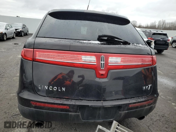 2014 Lincoln MKT with VIN 2LMHJ5FK9EBL50142, listed as a Copart auction lot 85564374 with 180,263 mi miles and Salvage Title. Bid and sale history available at DreamBid. Image 6.