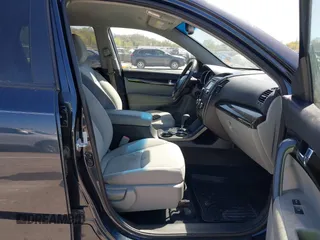 2013 Kia Sorento LX with VIN 5XYKTCA6XDG345234, listed as a IAAI auction lot 42047737 with 138,496 mi miles. Bid and sale history available at carsss.com. Image 5.