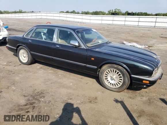 1996 Jaguar XJ with VIN SAJKX6747TC764559, listed as a Copart auction lot 48501775 with Not provided miles and Salvage title. Bid and sale history available at DreamBid. Image 4.