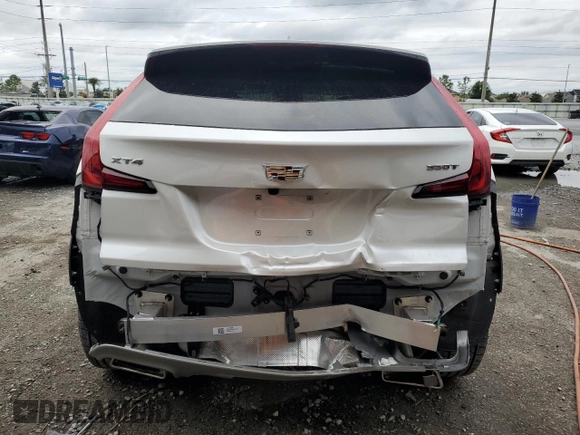 2023 Cadillac XT4 FWD Premium Luxury z VIN 1GYFZCR44PF105116, wystawiony jako Copart lot #51945915 z przebiegiem 20 669 mil mil oraz Szkoda całkowita • Salvage title. Historia ofert i sprzedaży dostępna na DreamBid. Obrazek 6.