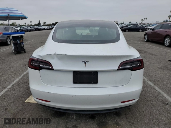 2020 Tesla Model 3 Standard Range Plus with VIN 5YJ3E1EA5LF747010, listed as a Copart auction lot 50937975 with Not Provided miles and Salvage Title. Bid and sale history available at DreamBid. Image 6.