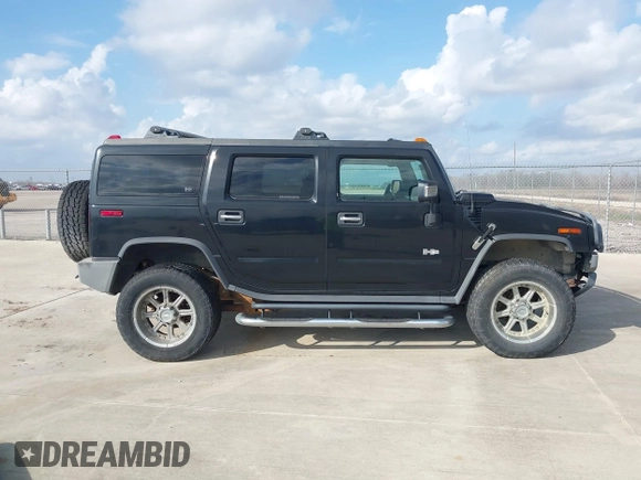 2006 Hummer H2 with VIN 5GRGN23U66H120601, listed as a IAAI auction lot 41524634 with 155,003 mi miles. Bid and sale history available at carsss.com. Image 13.