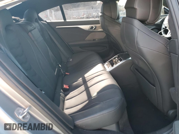 2023 BMW 8 Series M850i z VIN WBAGV8C0XPCK42813, wystawiony jako Copart lot #41823805 z przebiegiem Nie podano mil oraz Szkoda całkowita • Salvage title. Historia ofert i sprzedaży dostępna na DreamBid. Obrazek 10.