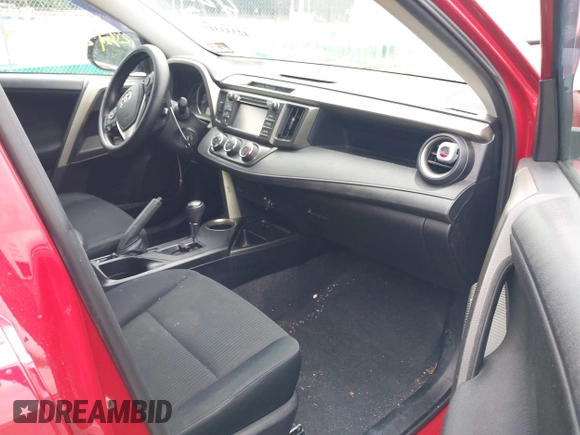 2015 Toyota RAV4 LE with VIN 2T3BFREV0FW249662, listed as a IAAI auction lot 42333319 with 128,030 mi miles and . Bid and sale history available at DreamBid. Image 5.
