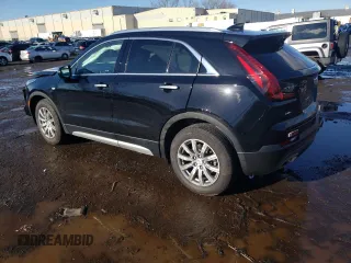 2021 Cadillac XT4 AWD Premium Luxury with VIN 1GYFZDR47MF023253, listed as a Copart auction lot 86620904 with 36,712 mi miles and Salvage Title. Bid and sale history available at carsss.com. Image 2.
