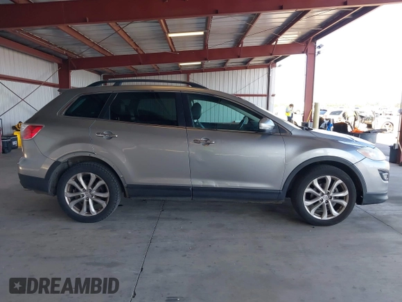 2012 Mazda CX-9 Grand Touring with VIN JM3TB3DV8C0366136, listed as a IAAI auction lot 42328716 with 192,142 mi miles and . Bid and sale history available at DreamBid. Image 13.