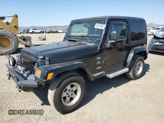 2004 Jeep Wrangler Sahara z VIN 1J4FA59SX4P718591, wystawiony jako Copart lot #59907805 z przebiegiem 241 994 mil mil oraz Czysty tytuł • Clean title. Historia ofert i sprzedaży dostępna na DreamBid. Obrazek 1.