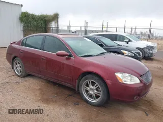 2002 Nissan Altima SE with VIN 1N4BL11E12C103029, listed as a IAAI auction lot 41953119 with 150,499 mi miles. Bid and sale history available at carsss.com. Image 1.