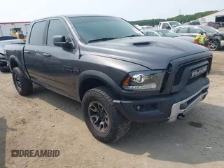 2017 Ram 1500 Rebel with VIN 1C6RR7YT6HS861839, listed as a IAAI auction lot 42407025 with 127,084 mi miles and . Bid and sale history available at DreamBid. Image 1.