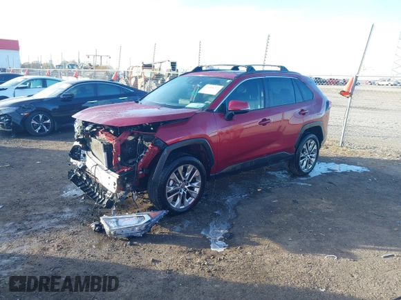 2021 Toyota RAV4 XLE Premium with VIN 2T3C1RFV1MW145048, listed as a IAAI auction lot 41018272 with 61,959 mi miles and . Bid and sale history available at DreamBid. Image 19.