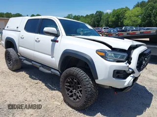 2020 Toyota Tacoma SR5 with VIN 5TFCZ5AN2LX235263, listed as a IAAI auction lot 42557802 with 149,504 mi miles and . Bid and sale history available at DreamBid. Image 1.