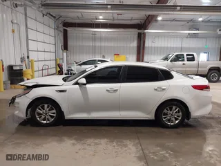 2016 Kia Optima LX with VIN KNAGT4L30G5072605, listed as a IAAI auction lot 41562330 with 152,320 mi miles. Bid and sale history available at carsss.com. Image 14.
