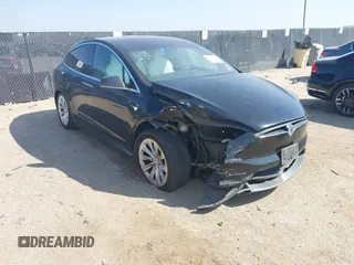 2019 Tesla Model X 75D with VIN 5YJXCBE22KF184504, listed as a IAAI auction lot 41802023 with 137,094 mi miles. Bid and sale history available at carsss.com. Image 1.