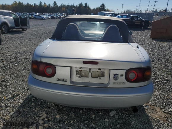 1991 Mazda MX-5 Miata Special Edition with VIN JM1NA3519M0233418, listed as a Copart auction lot 76767974 with 165,925 mi miles and Salvage Title. Bid and sale history available at carsss.com. Image 6.