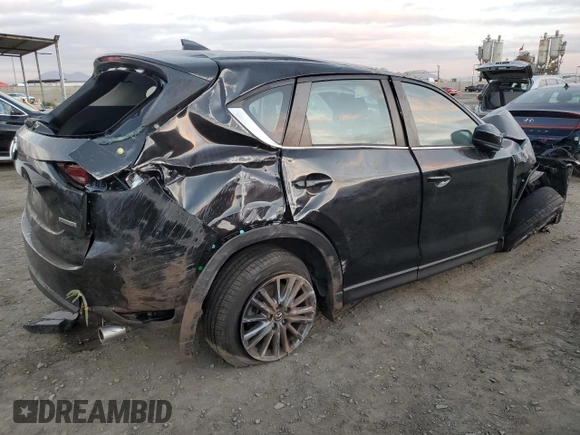 2021 Mazda CX-5 Sport with VIN JM3KFABM3M1334284, listed as a Copart auction lot 86915194 with 0 mi miles and Salvage Title. Bid and sale history available at carsss.com. Image 3.