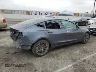 2020 Tesla Model 3 Standard Range Plus z VIN 5YJ3E1EA2LF704941, wystawiony jako Copart lot #58938485 z przebiegiem 34 851 mil mil oraz Szkoda całkowita • Salvage title. Historia ofert i sprzedaży dostępna na DreamBid. Obrazek 3.