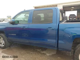 2015 Chevrolet Silverado 1500 LT with VIN 3GCPCREC2FG211914, listed as a IAAI auction lot 42025619 with 141,732 mi miles. Bid and sale history available at carsss.com. Image 14.