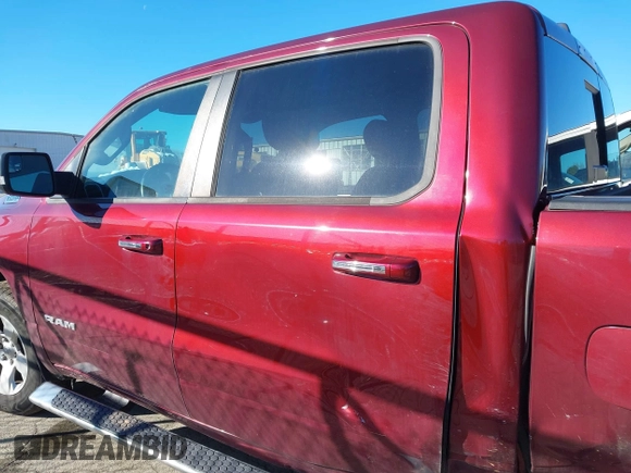 2019 Ram 1500 Big Horn/Lone Star with VIN 1C6SRFFT8KN870451, listed as a IAAI auction lot 41639815 with 100,924 mi miles. Bid and sale history available at carsss.com. Image 14.